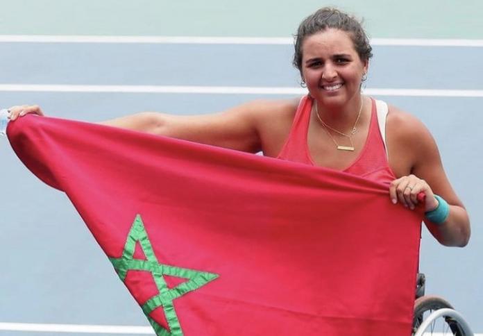 Najwa Awane with Morocco’s flag after her African Para Games success.