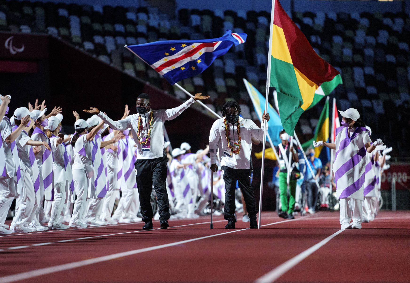 Emmanuel Oku carries Ghana’s flag at the Tokyo 2020 Closing Ceremony