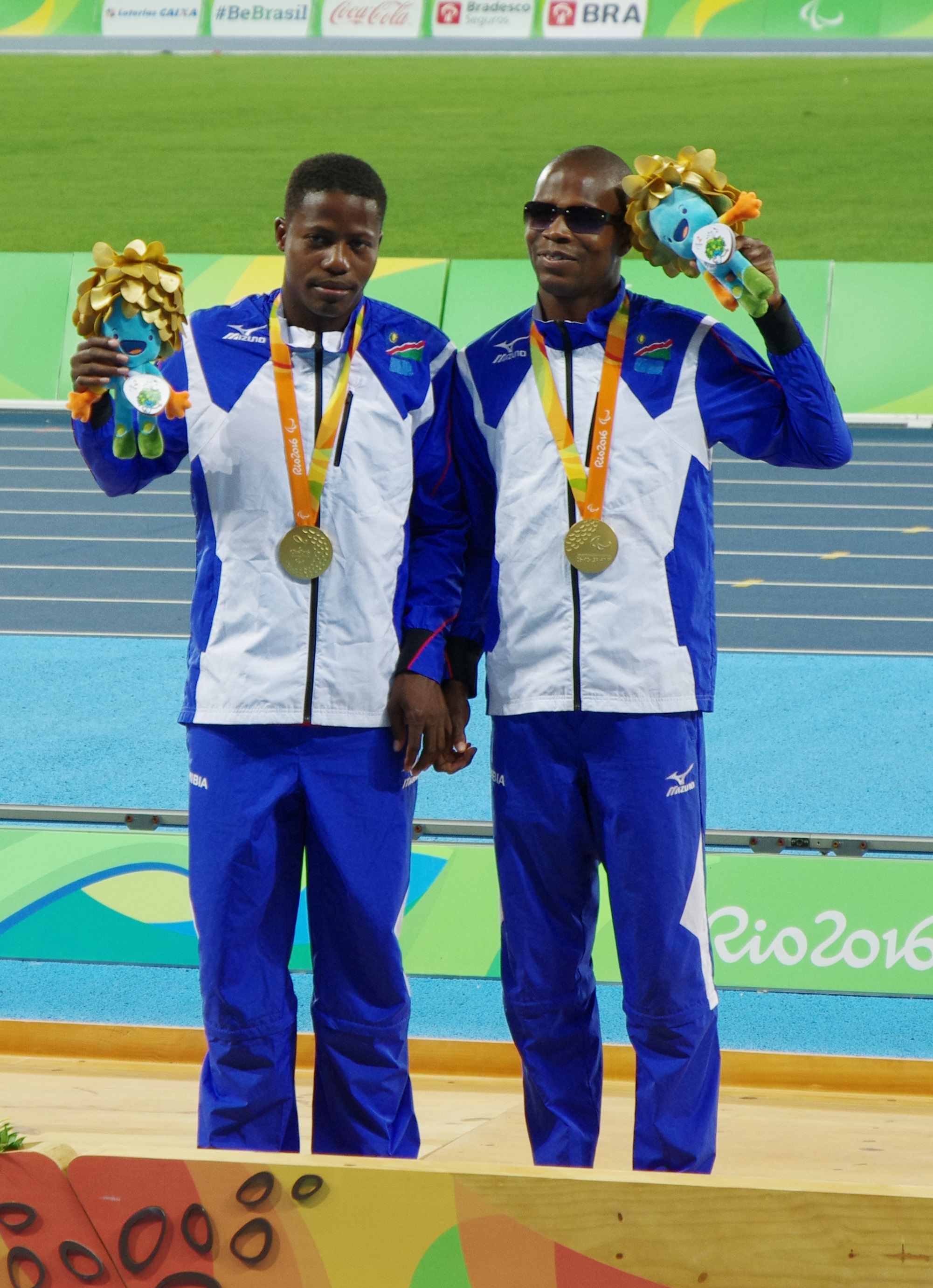 Ananias Shikongo and guide Even Tjiviju at the Rio 2016 Paralympic Games medal ceremony, 15 September 2016.