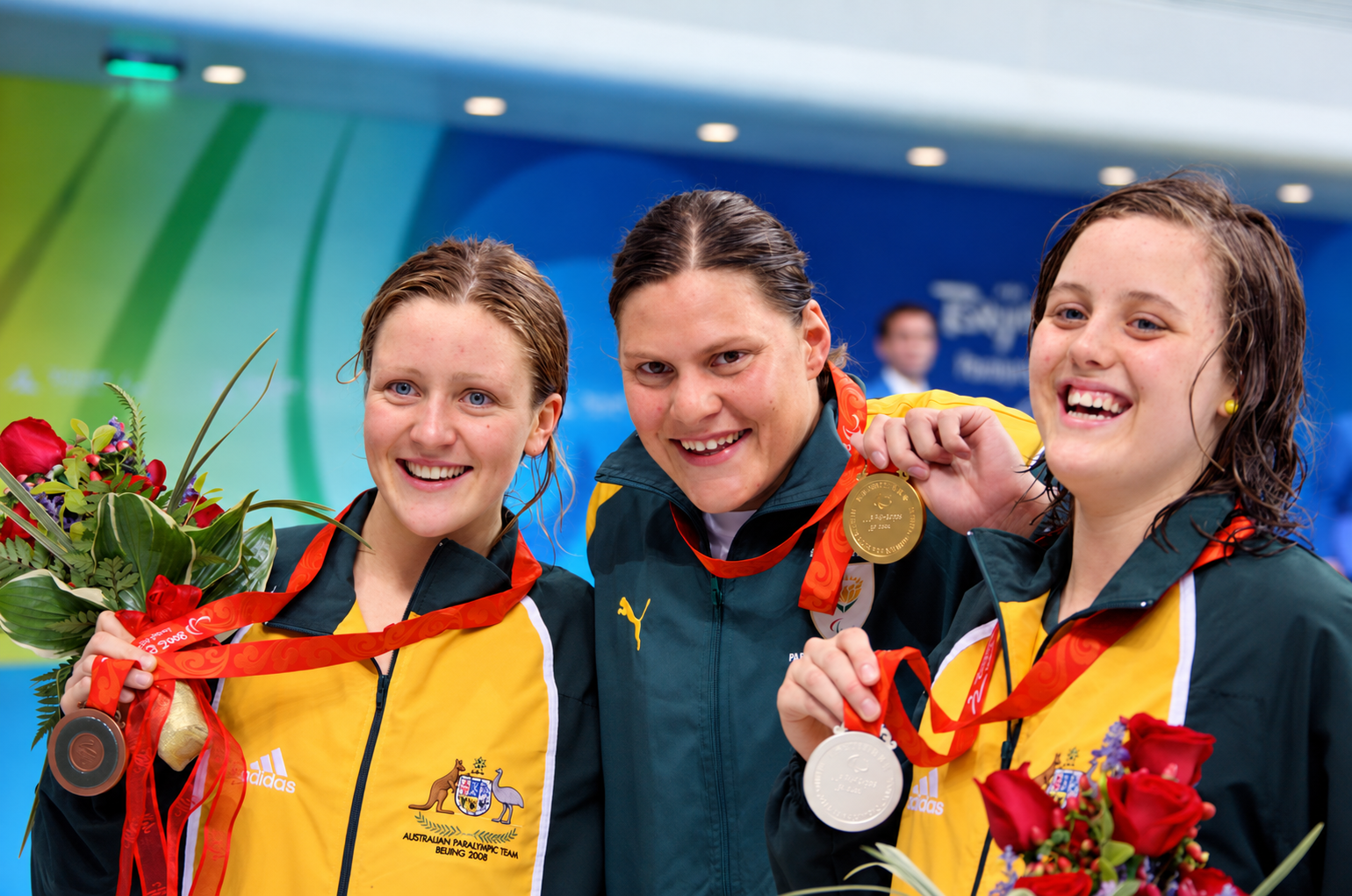 Natalie du Toit (centre) on the women’s 100m butterfly S9 podium at the Beijing 2008 Paralympic Games, 7 September 2008.