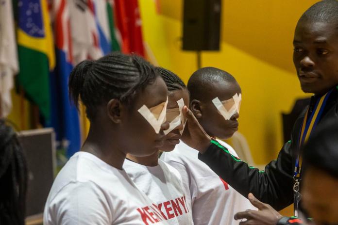 Kenyan goalball players prepare for competition.