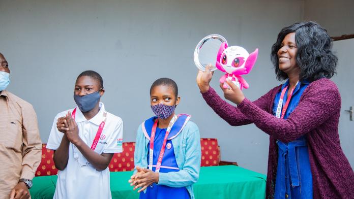 Participants celebrate the I’mPOSSIBLE recognition in Malawi.