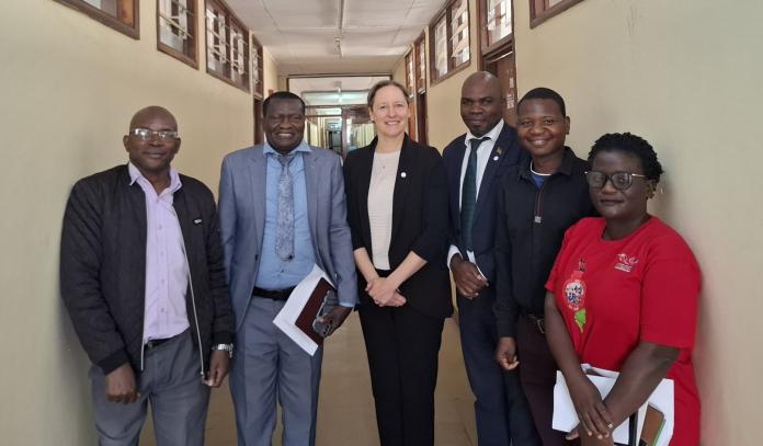 Molloy with Malawi ministry and Paralympic committee representatives.
