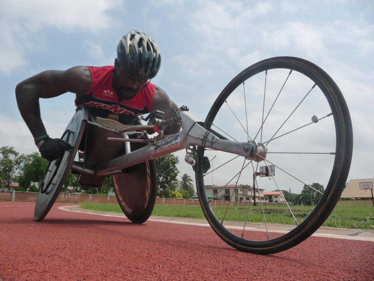 Raphael Botsyo Nkegbe in his racing wheelchair, in an IPC photograph accompanying its 2012 report on Ghana’s Paralympic preparations.