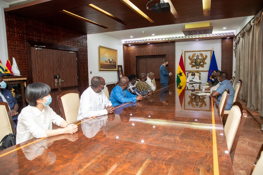 The Jubilee House discussions photographed along the length of the conference table.