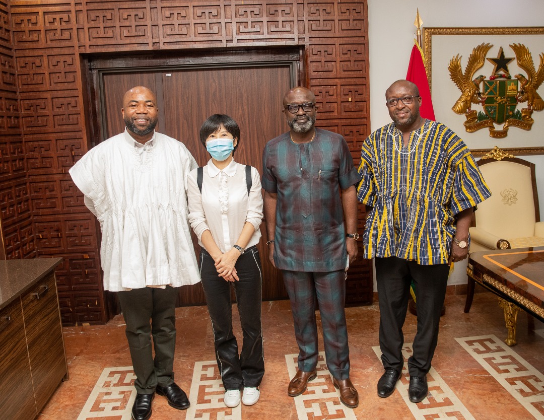 A second group portrait of four delegation members in the supplied collection.