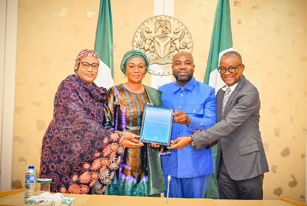 Oluremi Tinubu and Samson Deen with officials at the Grand Patron presentation in Abuja.